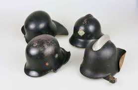 Sold at Auction: Feuerwehr. 4 alte Stahlhelme mit Innenfutter.