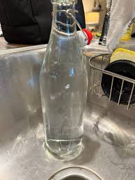 What is the mysterious object in the kombucha bottle?
