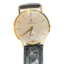 Sold at Auction: Croton Mens 18K Gold wristwatch