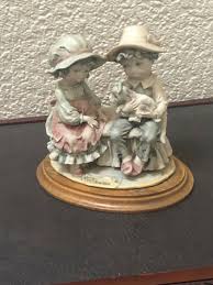 guiseppe armani figurine. Boy and girl with dog. Excellent condition. | eBay