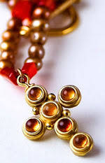 THE CITRINE CROSS, 18K GOLD VERMEIL ON PEARL STRAND. ONE OF ...