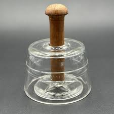 Sold at Auction: Bomer Round Glass Butter Mold with Star and ...