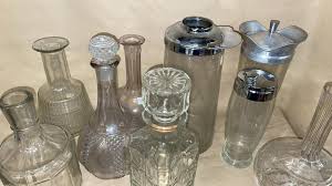 Sold at Auction: Mid Century Crystal Decanters and Shakers