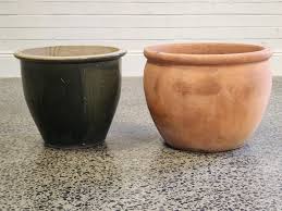 Lot - Large terracotta pot, together with a glazed ceramic ...