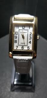 GOSSIP GOLD TONE LADIES WATCH - WHITE LEATHER BAND - MOP FACE-EASY READER | eBay