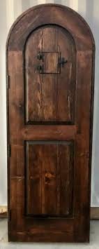 Rustic reclaimed solid lumber arched door wine room castle ...