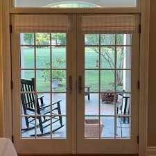 Another beautiful installation complete! Loving these plaid-mounted drapes on French doors, elegant style with a view to match. 🏡✨ #WilliamsFlooringCenter #DraperyDesign #HomeStyle