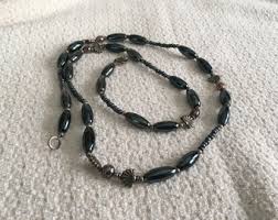 Robert Rose Silver Tone Black and Honey Colored Beads ...