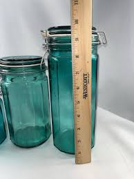 Set Of 3 Teal Green Glass Canisters W/ Hinged Lids Varying ...