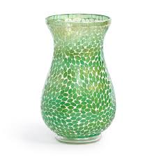 In a fresh, bright green color, bits of leaf-shaped glass ...