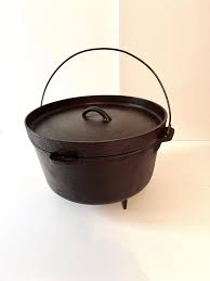 Cast Iron Pot or Cauldron on Three Lets with Handle | Chairish
