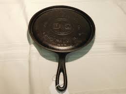 Sold at Auction: GRISWOLD # 7 HANDLED GRIDDLE (LBL EPU) PATTERN 607