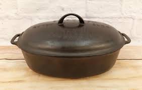 Sold at Auction: Antique Cast Iron Oval Roaster/Dutch Oven Set No. 5