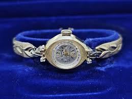 Sold at Auction: Rhapsody Royale Womens 14k Gold and Diamond Watch LOT 319