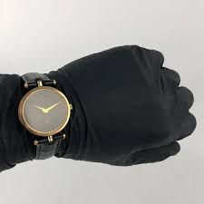 Gucci Women's Watch: Elegant Gold-Tone Design