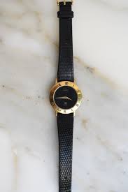 Gucci Small Black And Gold Watch | designers collab.