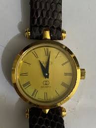 Vintage Gucci Gold Plated Mini Watch w/ Signature GG Back & Brown Leather Band | eBay