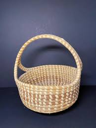 LOT 13: Vintage Sweetgrass Baskets | EstateSales.org