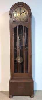 Sold at Auction: Antique Oak Case Dome top Grandfather clock