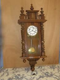 Old wall clock (Empire style) pendulum mechanism, ringtone ...