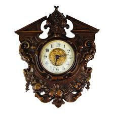 Late 19th - Early 20th Century French Antique Mural Bronze Cartel Clock | Chairish