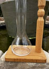 Pilsner Clear Glass Beer Cylinder Supported By Wooden Stand ...