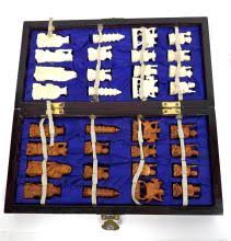 Sold at Auction: A Small Travelling Chinese Carved Chess Set in Timber Case, Early 20th
