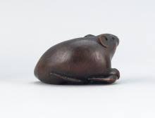 Sold at Auction: JAPANESE NAGOYA SCHOOL WOOD NETSUKE ATTRIBUTED TO ICHIMIN In the form of a rat resting on a bean pod. Inlaid eyes. Length 1.75". Pro...