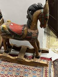 Sold at Auction: An Indian painted wood rocking horse 92cm ...