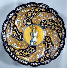 Godronnee Faience Cup Decorated with an Angel