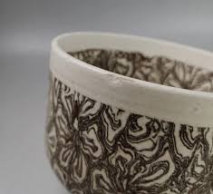 Sold at Auction: Chinese jiaotai black and white glazed 'flowers' porcelain brush waster