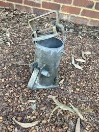 Steel caddy, around 30cm high, hollow with j-type handle/lid : r/whatisthisthing