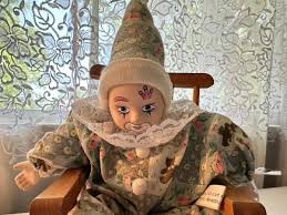 CLASSIC TREASURES CLOWN WITH WOODEN ROCKING CHAIR AND A CRAFT CLOWN | EstateSales.org