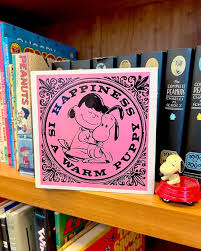 💕 The iconic phrase, “Happiness is a warm puppy,” debuted ...