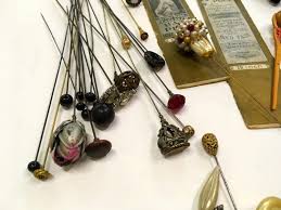 Sold at Auction: TWO TRAYS OF ANTIQUE & VINTAGE HAT PINS