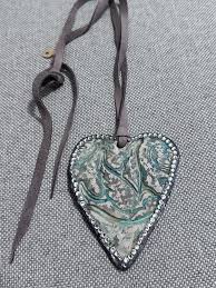 Hand Carved Heart Bird Necklace – Cotton Belles Boutique & Co