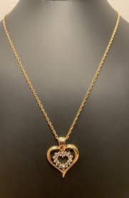 Beautiful Avon Vintage Gold Tone Five Way Reversible Heart Pendant Necklace | eBay