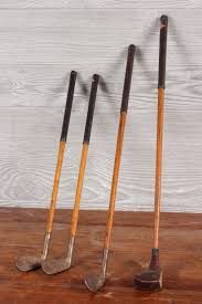 Sold at Auction: 4 CHILDREN'S WOODEN SHAFT GOLF CLUBS