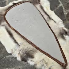 MANDLE NORMAN SHIELD, linen covered Wulflund