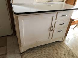 Sold at Auction: VINTAGE HOOSIER CABINET