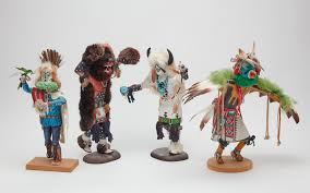 Lot - A group of four Native American polychrome decorated ...