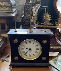 Sold at Auction: Jerome & co. flying pendulum clock