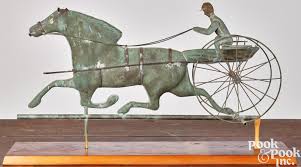 Sold at Auction: Swell bodied copper horse and sulky weathervane