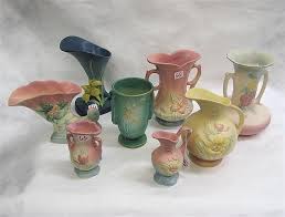 Lot - EIGHT PIECES AMERICAN ROSEVILLE & HULL POTTERY.
