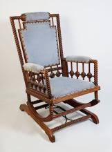 Sold at Auction: HUNTZINGER ROCKING CHAIR