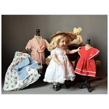 Full wardrobe for antique character doll. For Sale at Ruby Lane