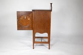 Shapland and Petter. An Arts and Crafts oak bedside cabinet ...