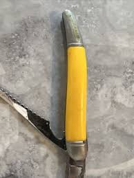 Vintage Imperial Fishing Fish Scaler Yellow Pocket Knife