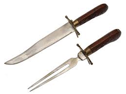 Sold at Auction: AN INDIAN ROSEWOOD CARVING SET OF KNIFE & FORK