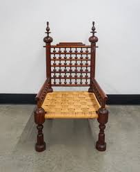 Lot - Middle Eastern Style Turned Wood Woven Seat Arm Chair, 41 1/2 x 21 1/4 x 21 in. (105.4 x 54 x 53.3 cm.), Seat Height: 12 in. (30.5 cm.)